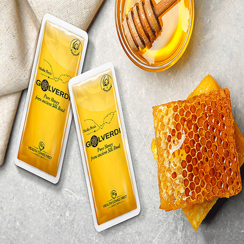 What is a vertical honey packaging machine and how does it work?