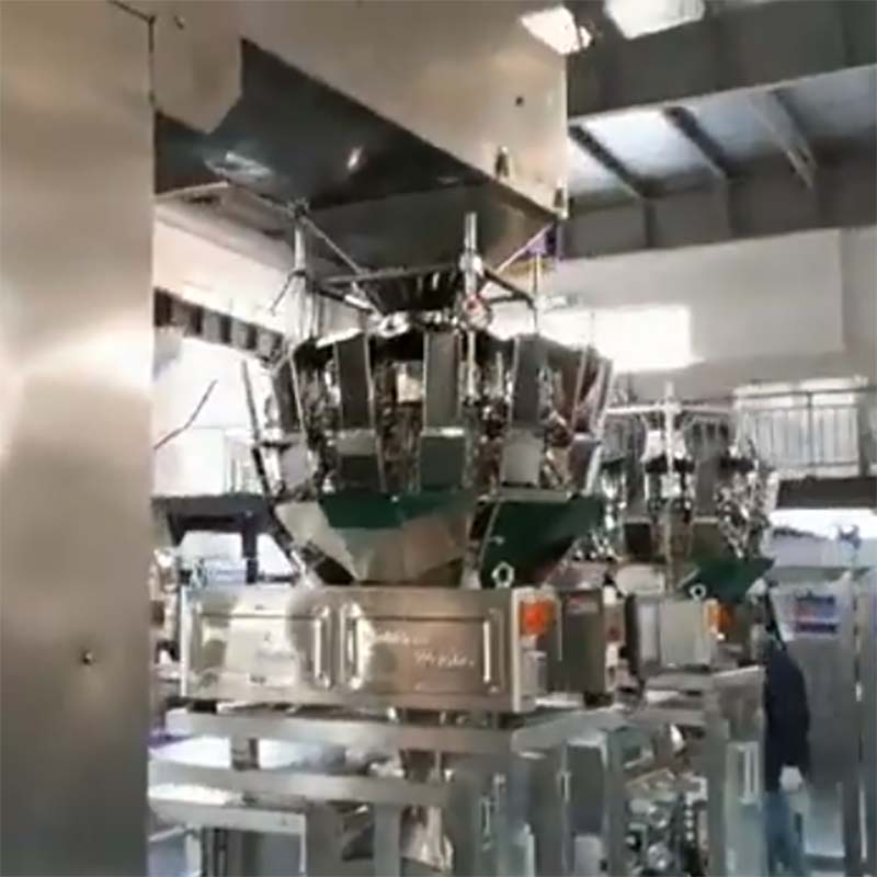 High speed filling and packaging machine for granular grain and rice